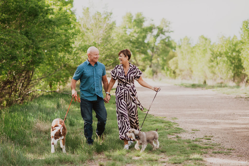 Shirley Peel and Kraig Peel walking their dogs